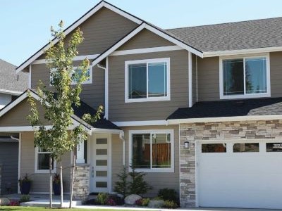 Grayish vinyl siding residential home